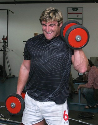 24.07.07 Wales World Cup Squad Training, St. Nazaire, France Huw Bennett feels the strain as The Welsh team spend a session in the gym at their training camp in St. Nazaire, France. Darren Griffiths/