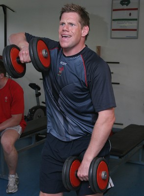 24.07.07 Wales World Cup Squad Training, St. Nazaire, France Rhys Thomas powers through his reps as The Welsh team take a session in the gym at their training camp in St. Nazaire, France. Darren Griffiths/