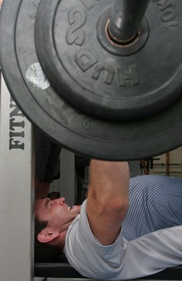 24.07.07 Wales World Cup Squad Training, St. Nazaire, France Micheal Owen powers through his reps as The Welsh team spend a session in the gym at their training camp in St. Nazaire, France. Darren Griffiths/