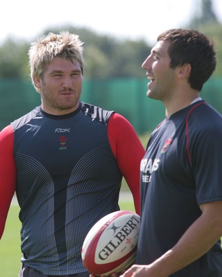 25.07.07 Wales World Cup Squad Training, St. Nazaire, France Richard Hibbard(L) share a joke with Gavin Henson during  training at  Wales' training camp in St. Nazaire, France. 