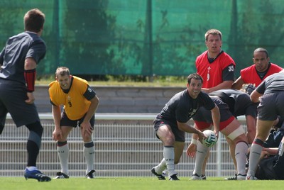 25.07.07 Wales World Cup Squad Training, St. Nazaire, France Gareth Cooper passes out to Ceri Sweeney during full contact training at  Wales' training camp in St. Nazaire, France. 