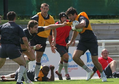 25.07.07 Wales World Cup Squad Training, St. Nazaire, France Mike Phillips gets collared by Gavin Evans during full contact training at  Wales' training camp in St. Nazaire, France. 