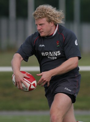 25.07.07 Wales World Cup Squad Training, St. Nazaire, France Duncan Jones prepares to slip out a pass during training at  Wales' training camp in St. Nazaire, France. 