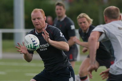 25.07.07 Wales World Cup Squad Training, St. Nazaire, France Martyn Willliams recieves a pass from Gareth Thomas during the morning session at  Wales' training camp in St. Nazaire, France. 