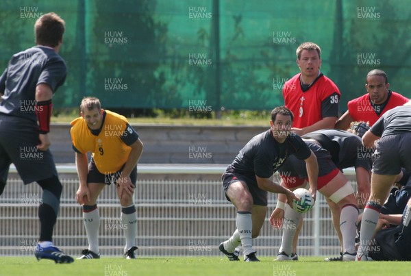 25.07.07 Wales World Cup Squad Training, St. Nazaire, France Gareth Cooper passes out to Ceri Sweeney during full contact training at  Wales' training camp in St. Nazaire, France. 