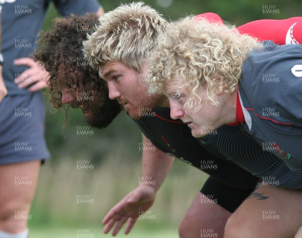 25.07.07 Wales World Cup Squad Training, St. Nazaire, France (L-R) Adam Jones, Richard Hibbard & Duncan Jones prepare to scrummage during the morning session at  Wales' training camp in St. Nazaire, France. 