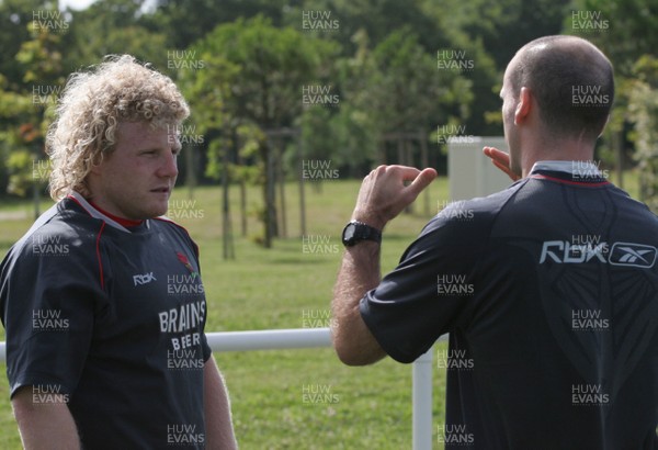 25.07.07 Wales World Cup Squad Training, St. Nazaire, France Duncan Jones(L) discusses scrummaging with referee Tim Hayes during the morning session at  Wales' training camp in St. Nazaire, France. 