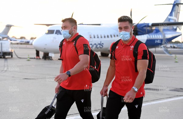 221020 - Wales Rugby Squad Travel to Paris - Sam Parry and Rhys Webb gets off the plane after arriving in Paris