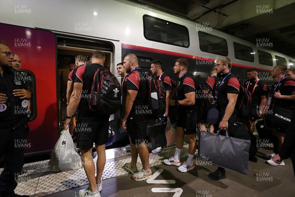 070923 - The Wales Rugby Travel from Paris to Bordeaux on the train ahead of their opening Rugby World Cup game -  Wales board the train