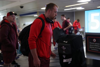 130726 - Wales Rugby team travel to South Africa from Argentina - Tommy Reffell