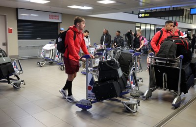130726 - Wales Rugby team travel to South Africa from Argentina - Dan Edwards