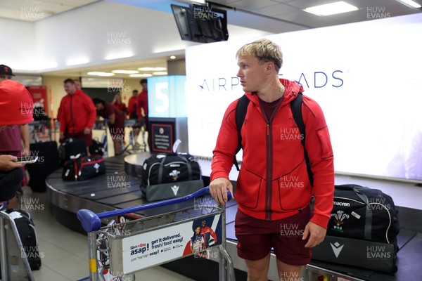 130726 - Wales Rugby team travel to South Africa from Argentina - Blair Murray