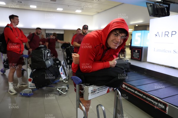 130726 - Wales Rugby team travel to South Africa from Argentina - Eddie James