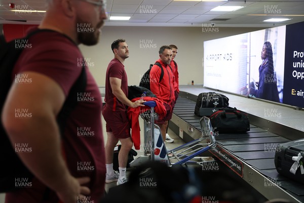 130726 - Wales Rugby team travel to South Africa from Argentina - Tomos Williams