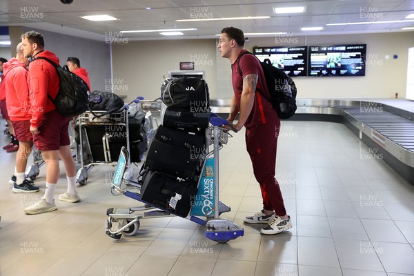 130726 - Wales Rugby team travel to South Africa from Argentina - Josh Adams