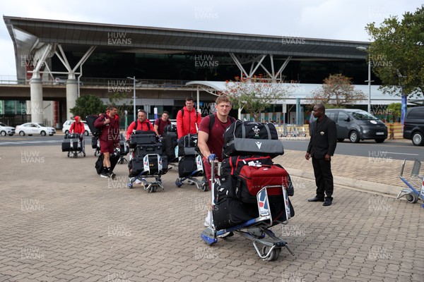 130726 - Wales Rugby team travel to South Africa from Argentina - Jac Morgan