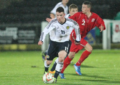 311013 - Wales v Scotland Under 16 Victory Shield International, Aberystwyth - Scotland's Alistair Coote gets away from Wales' Cameron Coxe