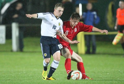 311013 - Wales v Scotland Under 16 Victory Shield International, Aberystwyth - Scotland's Mackenzie Heaney holds off Wales' Joe McNulty