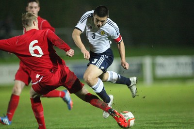 311013 - Wales v Scotland Under 16 Victory Shield International, Aberystwyth - Scotland's Leon Jones is tackled by Wales' Sam Williams