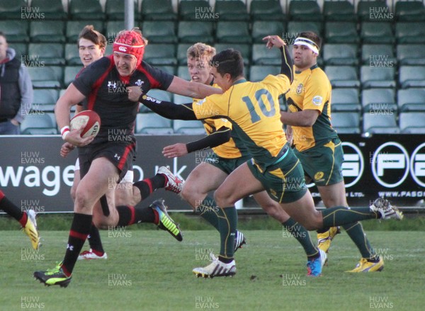 221113 - Wales U18s (A) v Australia Schools U18s -Tyler Morgan of Wales is challenged by Mitchell Third of Australia