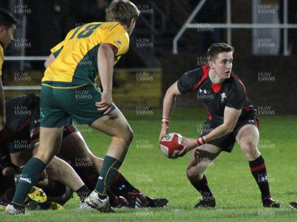 221113 - Wales U18s (A) v Australia Schools U18s -Dan Brooks of Wales pass the ball out of the ruck