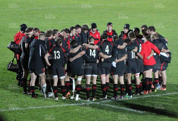 221113 - Wales U18s (A) v Australia Schools U18s -Wales coaches talk to the team following their win over the Australia Schools team at The Gnoll