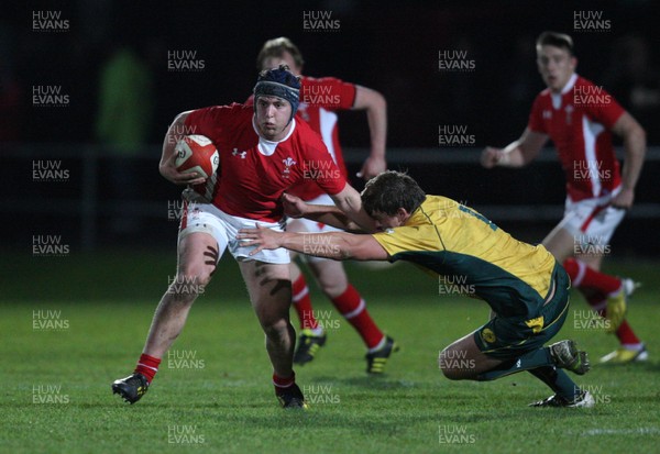 271113 - Wales U18s v Australia Schools U18s, Neath - Wales' Ryan Elias gets past Australia's Matthew Sandell