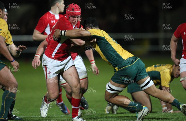 271113 - Wales U18s v Australia Schools U18s, Neath - Wales' Tyler Morgan takes on Australia's Rohboni Warren-Vosayaco