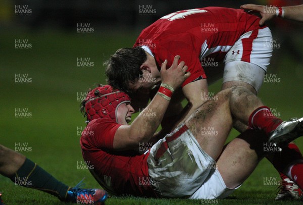 271113 - Wales U18s v Australia Schools U18s, Neath - Wales' Tyler Morgan celebrates with Wales' Garyn Smith after scoring try