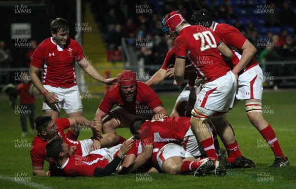 271113 - Wales U18s v Australia Schools U18s, Neath - Wales players celebrate with Wales' Tyler Morgan after he scores the final try