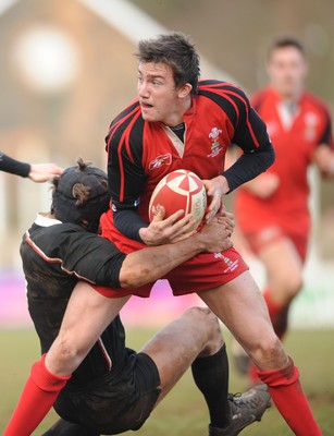 27.01.08 - Wales Under 18s v England Elite Under 18s - Wales' Matthew Jarvis takes on the English defence 