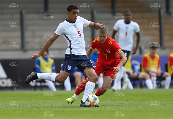 030921 - Wales U18 v England U18, International Friendly Match - Lee Jonas of England takes on Morgan Williams of Wales