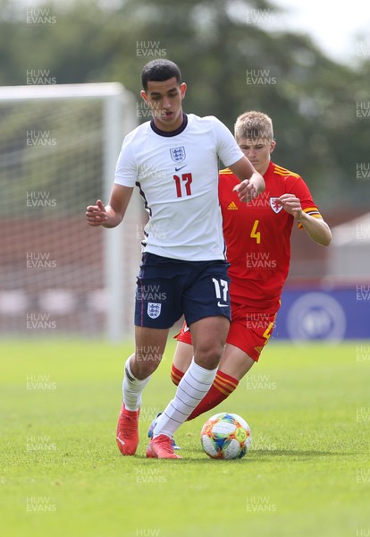 030921 - Wales U18 v England U18, International Friendly Match - Sonny Perkins of England holds off Jordan James of Wales