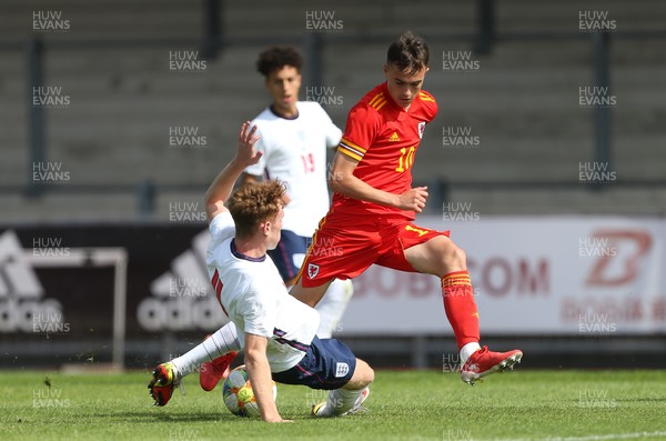 030921 - Wales U18 v England U18, International Friendly Match - Luke Harris of Wales is tackled by Brodi Hughes of England