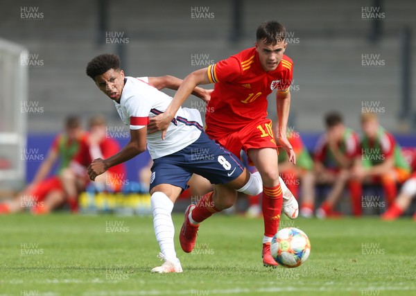030921 - Wales U18 v England U18, International Friendly Match - Rico Lewis of England and Luke Harris of Wales tangle as they compete for the ball