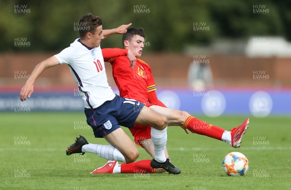 030921 - Wales U18 v England U18, International Friendly Match - Joel Cotterill of Wales and Jack Wells-Morrison of England compete for the ball