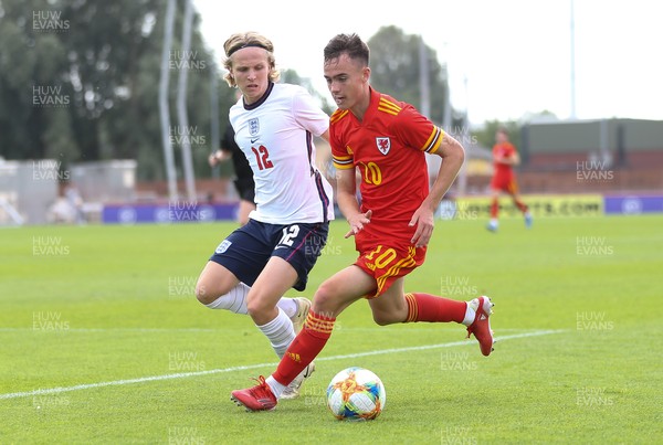 030921 - Wales U18 v England U18, International Friendly Match - Tyler Evans of Wales takes on Samuel Braybrooke of England