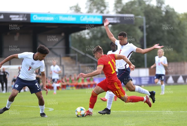 030921 - Wales U18 v England U18, International Friendly Match - Cian Ashford of Wales gets past Lee Jonas of England