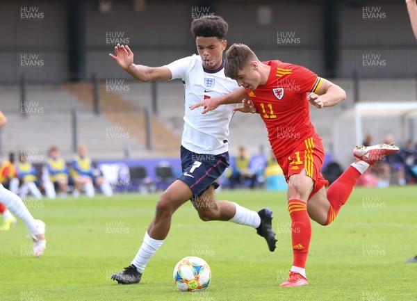 030921 - Wales U18 v England U18, International Friendly Match - Cian Ashford of Wales gets holds off Jadel Katongo of England