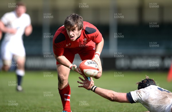 230314 - Waleds Under 18 v England Under 18 -Daniel Jones of Wales is tackled by Kieran Treadwell