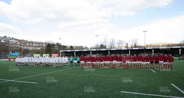250318 - Wales U18 v England U18 - The England and Wales U18 teams lineup for the national anthems