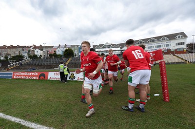 260323 - Wales U18 v England U18 - The Wales team run out onto the pitch