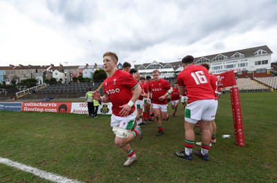 260323 - Wales U18 v England U18 - The Wales team run out onto the pitch