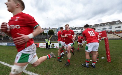 260323 - Wales U18 v England U18 - The Wales team run out onto the pitch