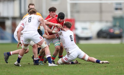 260323 - Wales U18 v England U18 - Evan Minto of Wales takes on Reuben Logan of England