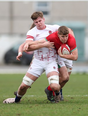 260323 - Wales U18 v England U18 - Steffan Emanuel of Wales takes on Reuben Logan of England and Jack Bennett of England