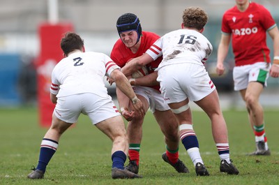 260323 - Wales U18 v England U18 - Saul Hurley of Wales takes on Jacob Oliver of England and Conor Byrne of England