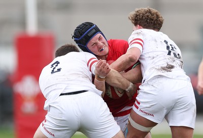 260323 - Wales U18 v England U18 - Saul Hurley of Wales takes on Jacob Oliver of England and Conor Byrne of England