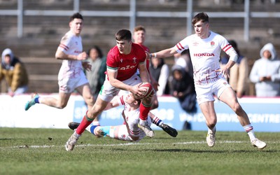 260323 - Wales U18 v England U18 - Harry Rees-Weldon of Wales is tackled