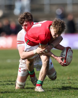 260323 - Wales U18 v England U18 - Carwyn Edwards of Wales is tackled